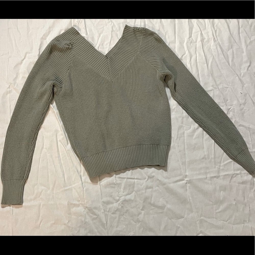 off shoulder teal sweater. Super cute!